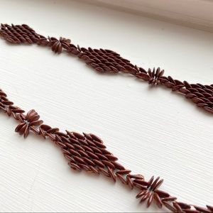 Wooden necklace weaved